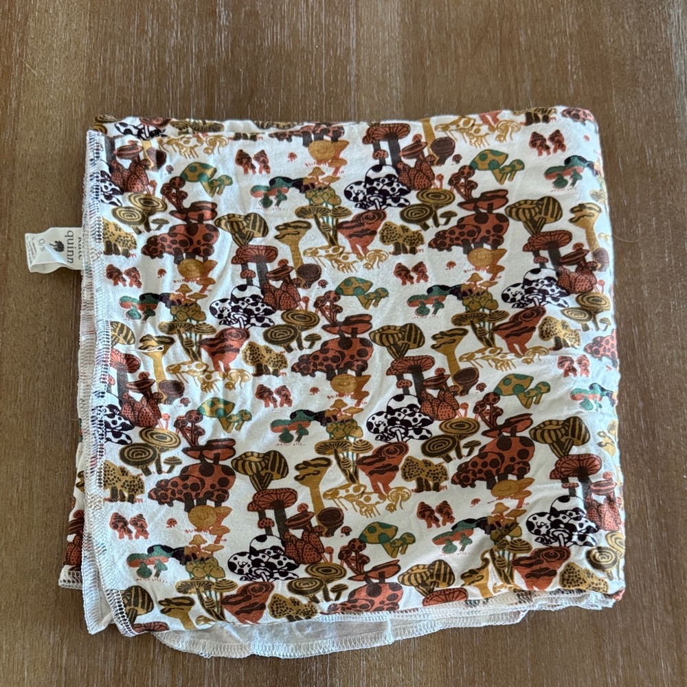 Kate Quinn Mushroom swaddle blanket